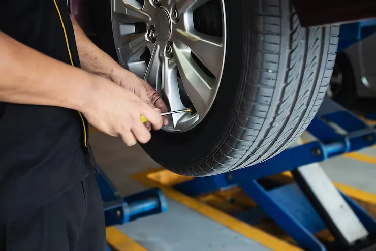 imgi 21 technician is inflate car tire car maintenance service transportation safety 1150 18089 2